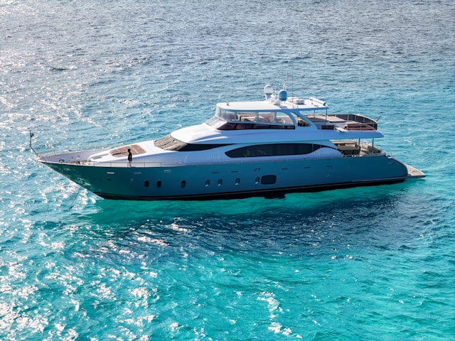 Aerial Side-Shot of Stationary Yacht on Clear Water