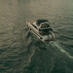 Angled Aerial Shot of Backend of Cruising Yacht