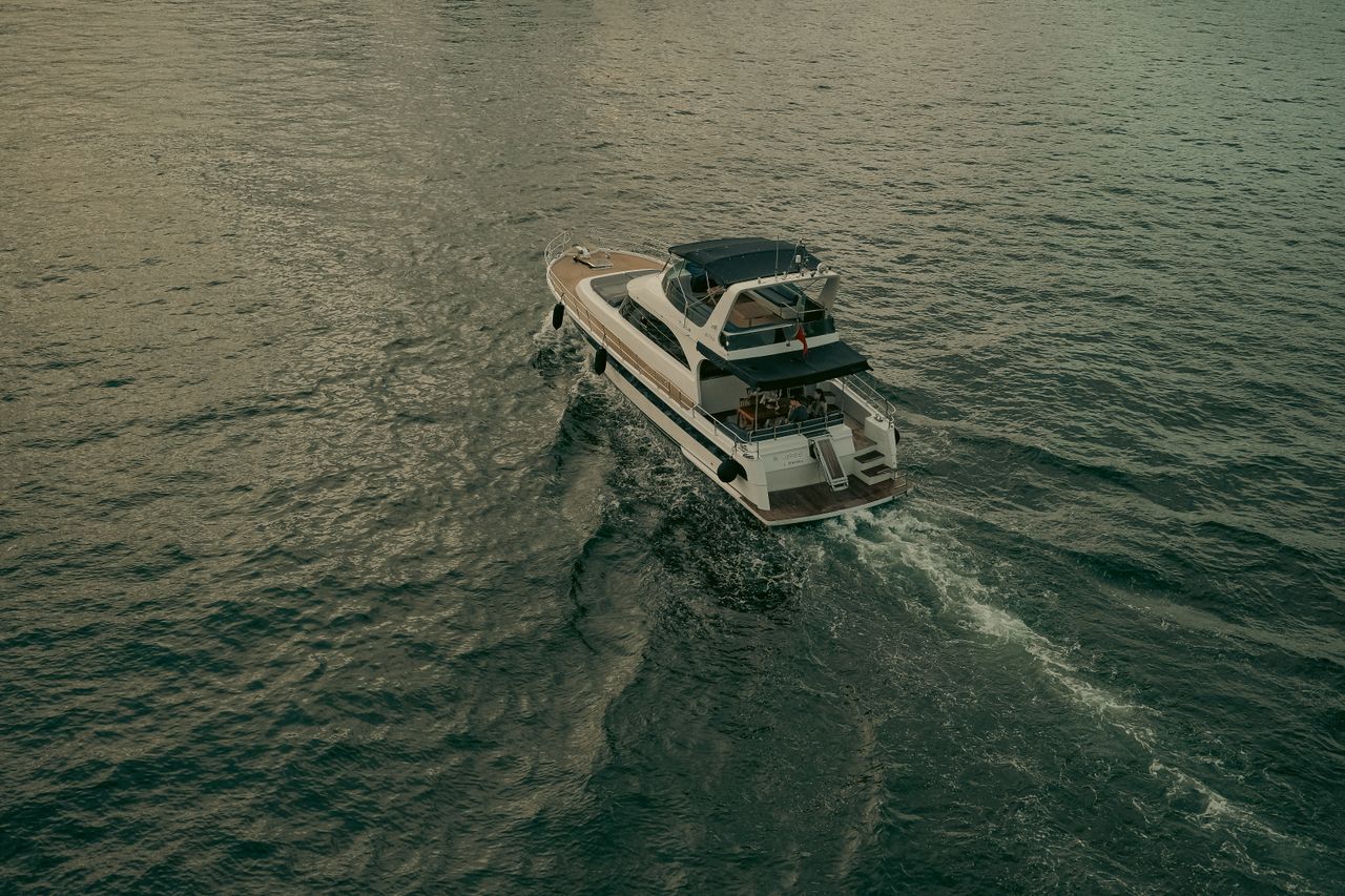Angled Aerial Shot of Backend of Cruising Yacht