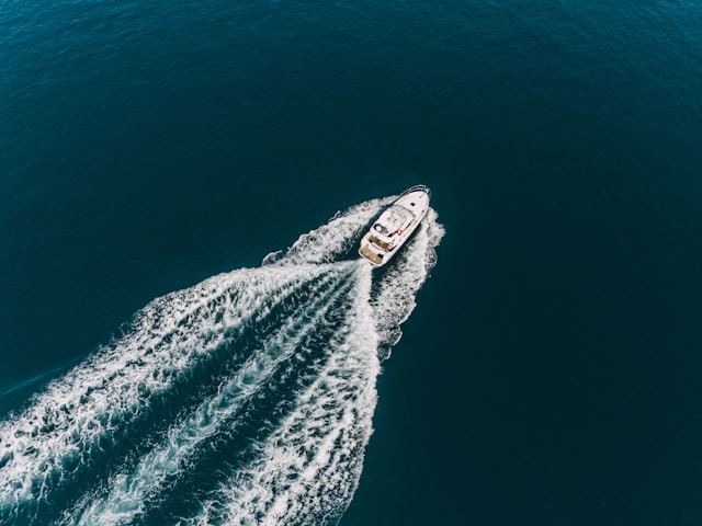 Overhead Shot of Yacht Cruising Through Water